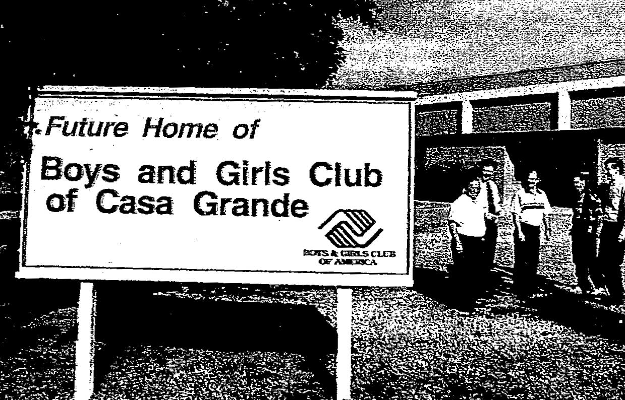 Photo from Casa Grande Dispatch, Showing sign of "Future Home of Boys and Girls Club of Casa Grande"