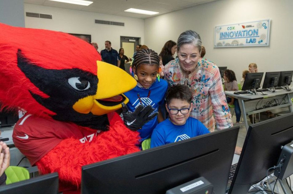 Redbird Mascot with Kids in computer lab